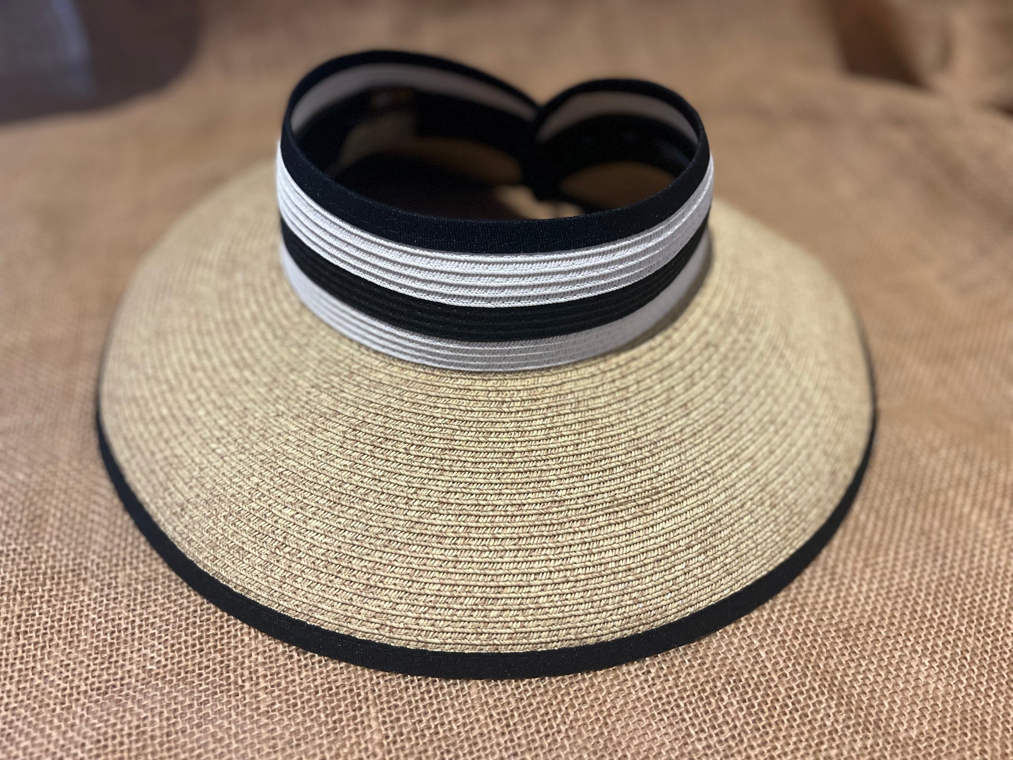 White rollup hat with black stripe