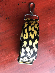 Black and yellow crossbody strap